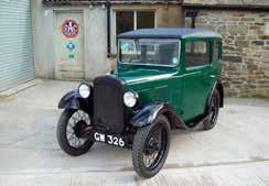 Finished in a deep green fabric body with black patina painted wings, the engine breaths through twin SU carburettors with duralumin push rods and lightweight aluminium clutch housing giving the
