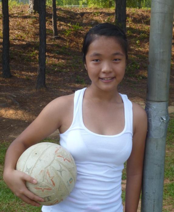 Niang Muang 13 yrs I feel lucky to be able to join the program and I really enjoy it. I got to make new friends and meet new people as I learn how to play netball.