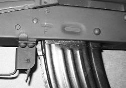 9. Remove the magazine from the rifle. 10. Check the rifle s chamber to ensure it does not contain a round of ammunition.