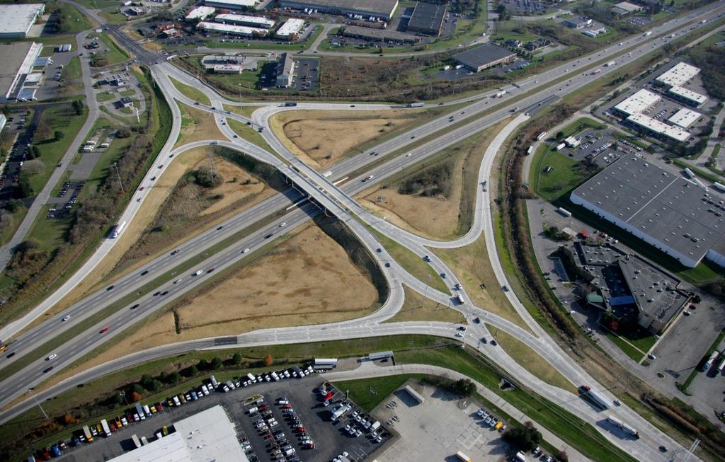 5 Interchange Design By allowing the rap-terinal intersections to operate with siple, two-phase signal operations, the design provides flexibility to accoodate a greater volue of traffic and operate