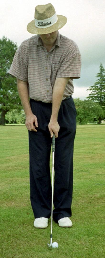 Although this golfer is doing this exercise with an iron, you should do it with a driver.