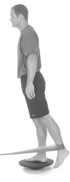 Extend your hip against the band and slowly return, keeping your knee straight. Keep board parallel to ground. Keep your back and neck straight.