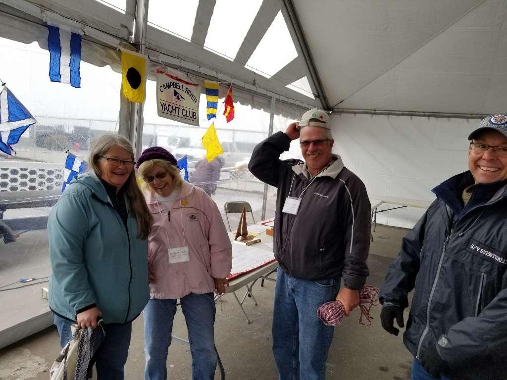 Left to right: Marg Swain, Dona Lambert, Leo Lambert and Dan Swain entertaining themselves at the Ocean Pacific Boatshow on April 14.