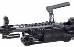 56 mm 1,000 meter mechanical rear sight Bolt handle folds in when not in use Carrying grip is also barrel change handle Flip-up front sight MG4 variants use a long stroke gas system with a rotating
