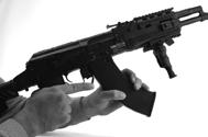 4 Loading & Unloading the Magazine To Load BBs Make sure the airsoft gun is on SAFE (see section 8) and pointed in a SAFE DIRECTION. Use 6mm plastic BBs only in this airsoft gun.