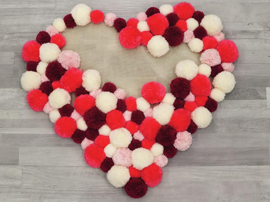 To do so, arrange your pom-poms on the canvas the way you want them and take a picture of your arrangement so that you can always have a look later when you re