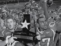 The Utes hoisted the championship trophy after the 2006 Armed Forces