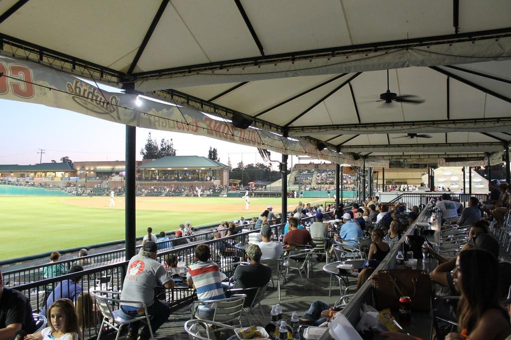 A great spot for large groups that want to socialize while taking in a ballgame, the Coors Light Cold Zone is located down the left field line and has four decks filled with tables and chairs,