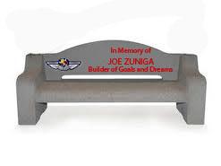 Style C - The team logo on the back of the bench with a memorial statement engraved into the bench and filled with an epoxy on