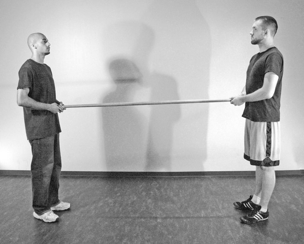 of the quarterstaff against your stomach, the other end against your partner s stomach). Not maintaining the proper distance is the most common error for combatants.