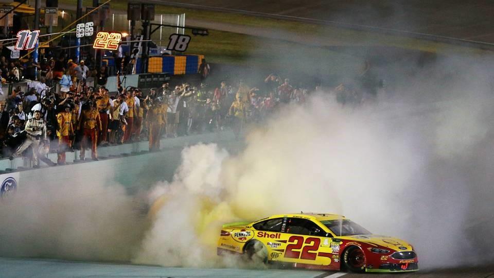 Volume 13, Issue 10, Number 128, Page 3 By DAN BERNSTEIN Sporting News Joey Logano claimed his first NASCAR Cup Series championship Sunday when he pulled away from rival Martin Truex Jr.