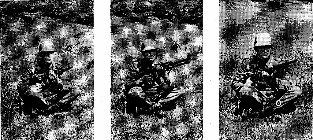 required form of fire; in the ''load'' position (Picture 13) the rifleman holds the weapon with the right hand by the small of the stock, and with the left hand at the wooden fore end, keeping both