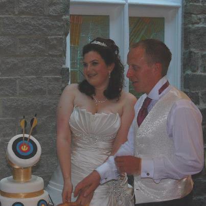 The wedding was archery themed, which was very apt as that was what got them together in the first place.