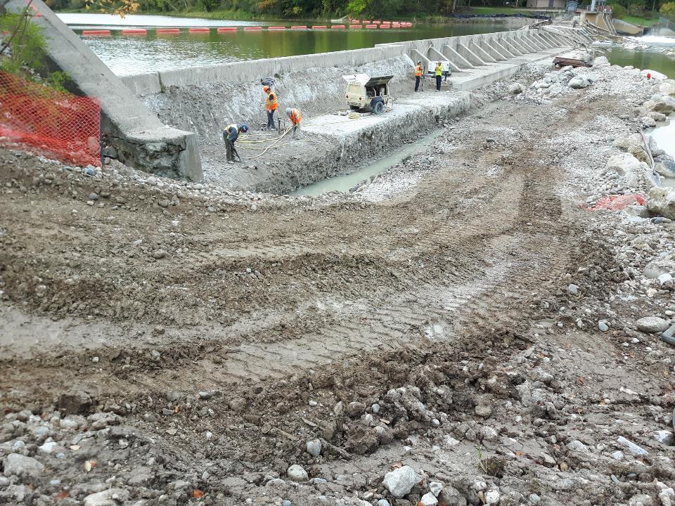 Construction crews working on the rehabilitation of Denny s Dam, an important Sea Lamprey barrier on the Saugeen River, near Southampton, ON.