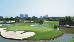 HAIKOU Three Miles Golf Course Carved out of some 2,500 acres of volcanic terrain, the Three Miles Golf Course in Haikou weaves through a series of volcanic rock formations and natural lakes lending