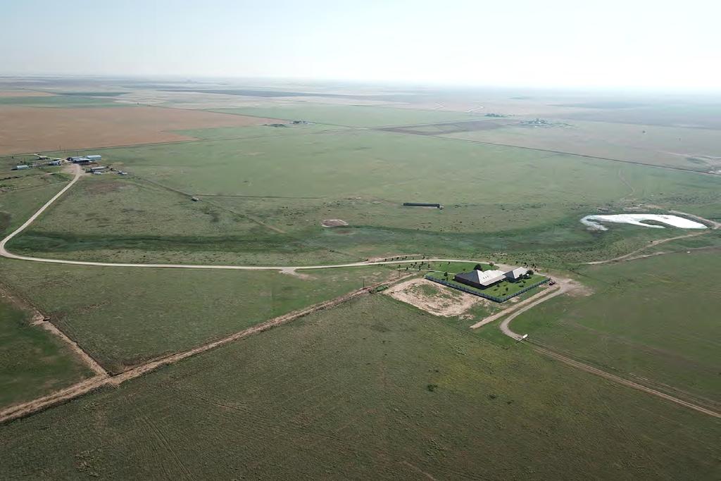 If you are looking for a ranch headquarters with a modern brick home, and well-designed and functional livestock improvements and barns, this offering should not be missed.