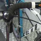 The rear derailleur cable then runs along the top tube to the net cable stop located by the seat tube.