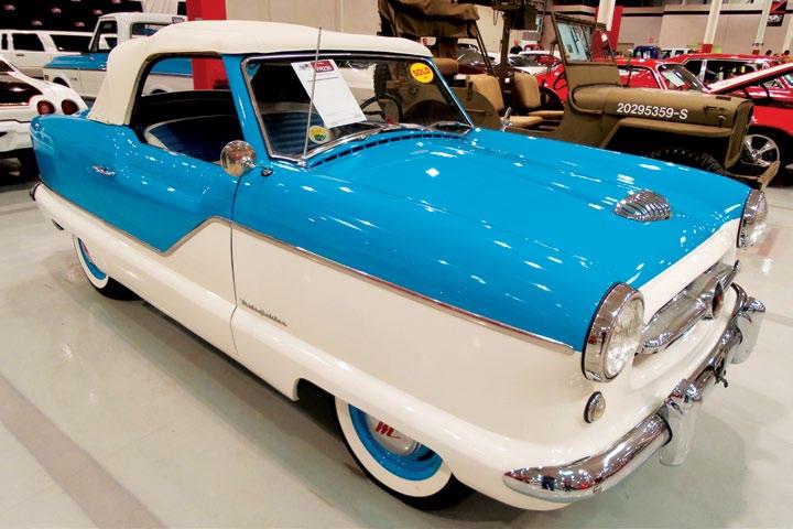 A colorful Nash Metropolitan at the Classic Car Auction in
