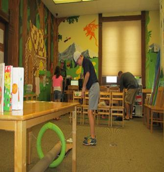 putt-putt covering 2 floors of the library with a challenge hole that featured a special prize for a hole in one.