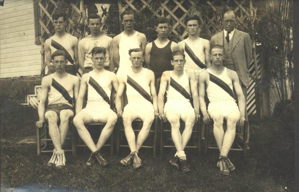 Swim Team- 1929 Front Row: Ernest Beverage, Charles Trimble, Otis Hassle, Charles Swadley, Jennings