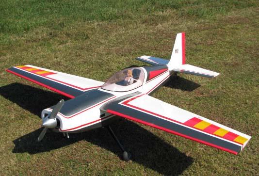 Receiver ready, scratch built Extra, built by the late Max Harris. It has a 68 wingspan with a Super Tigre 91 (made in Italy).