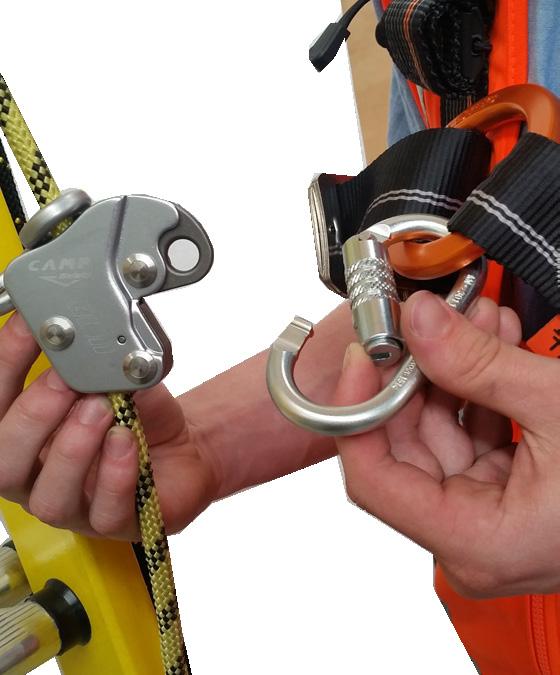 16. Attach Harness onto Fall Arrest Device 1 2