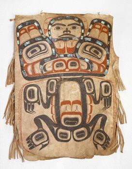 Artifact: Background Information: Materials: Tunic with brown bear and mountain spirit designs This tunic, or shirt, was created by the Tsimshian (tsim-shee-un) people in the 1800s.