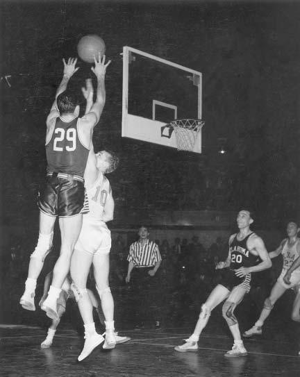 Tournament Moments 125 ATTENDANCE AND SITES March 22, 1947, Western regional final in Municipal Auditorium in Kansas City, Missouri Down by a point with seven seconds remaining,