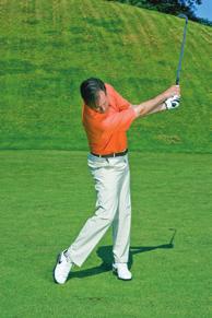 Hold the club as you would during a normal swing, but choke down on it hold the club closer to the shaft. Your hands should reach almost to the bottom of the grip.