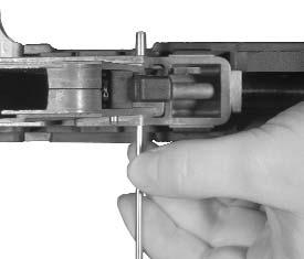 fig. 9), remove the transversal locking pin above the