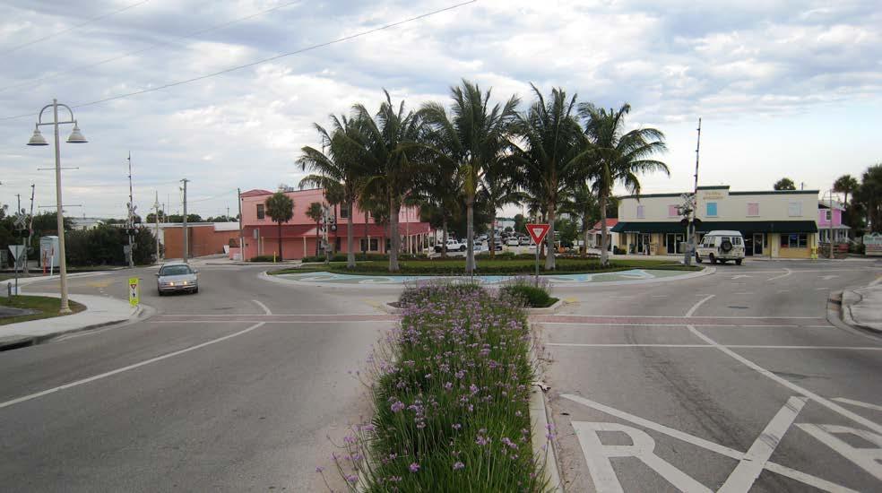 Any intersection with more than four legs will operate safer and more efficiently than the same intersection with traffic signals. Figure 6. West approach to Jensen Beach Roundabout.