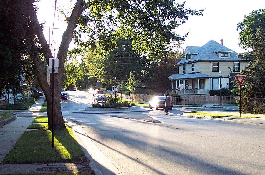 Access Management Figure 8. A traffic-calming roundabout in Elgin, Illinois where the roller blade rider is traveling as fast as the car.