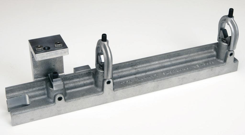 Movable fixture arm locates the holes to a standard spacing determined by the over-arm, which has standard, built-in spacing increments of.500" and.860" between centers.