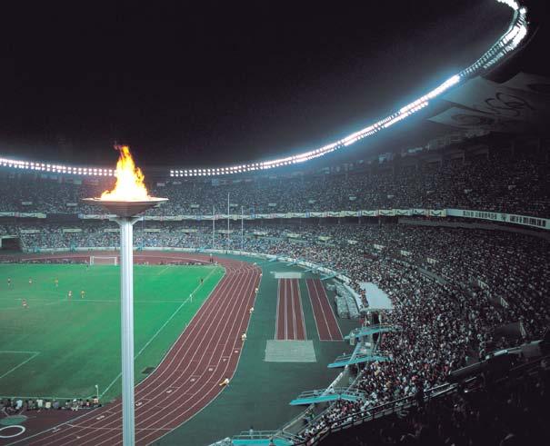 The torch is lit in Greece several months before the start of the games. It is then carried to the host city by a series of runners. It arrives at the Olympic stadium on the opening day of the games.