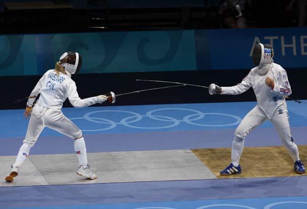 men s rings fencing women s balance beam Fencing mask and sabers Gymnastics Gymnasts leap, flip, and twirl through the