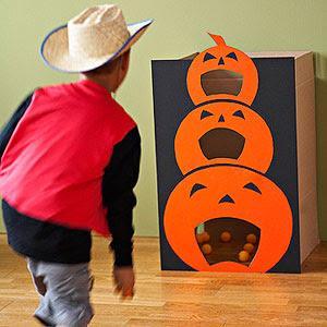 Halloween Points in the Pumpkin Get a large cardboard box and cover it with black card or paper.