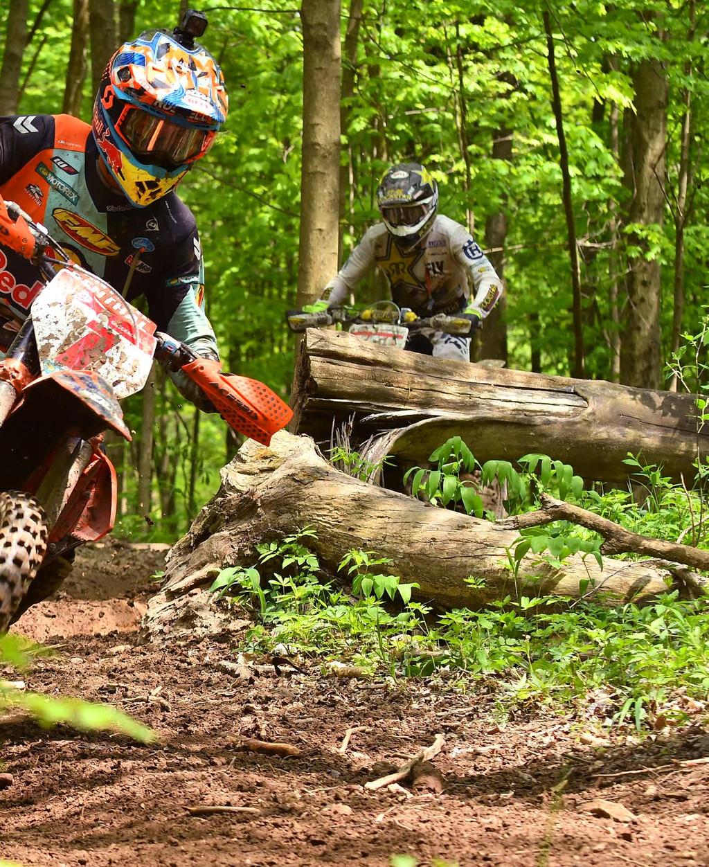VOL. 55 ISSUE 19 MAY 15, 2018 P77 Kailub Russell (1) leads Thad Duvall through the woods late in the race.