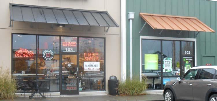 keeps window signs in proportion to windows: Example 3: Typical multi-tenant retail strip (20-foot wide