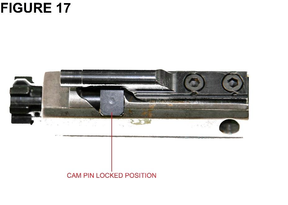 6. Remove the firing pin from the rear of the bolt carrier (Fig. 16). 7.