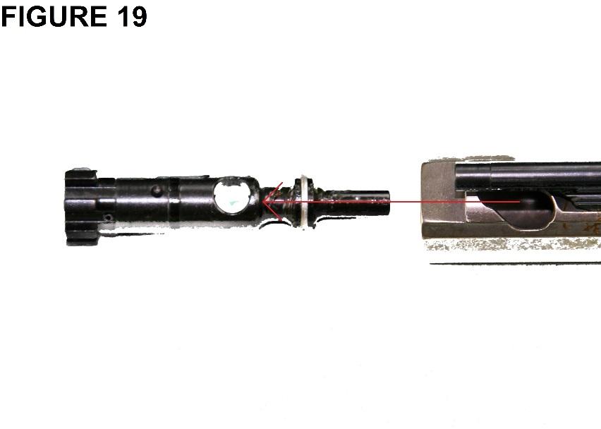 8. Rotate the cam pin and lift out of the bolt carrier (Fig. 18). 9. Pull the bolt assembly straight out from the bolt carrier (Fig. 19).