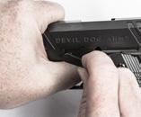 3. Use the included hex wrench to relieve tension on the recoil guide rod.
